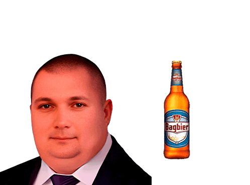 a man in a suit and tie is next to a bottle of bagbier