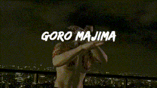 a video game character named goro majima is dancing