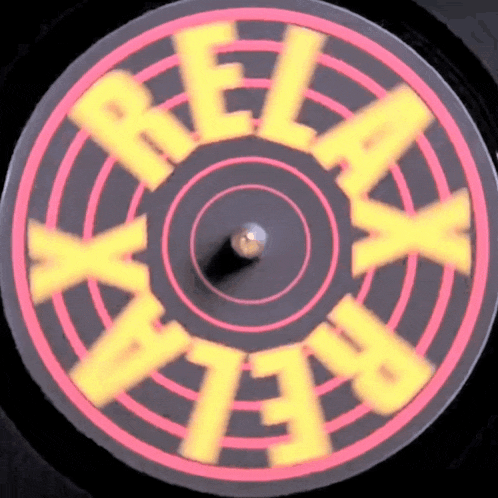 a red and yellow circle with the words relax on it