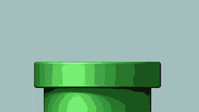 a girl in a pink hat is standing in a green box