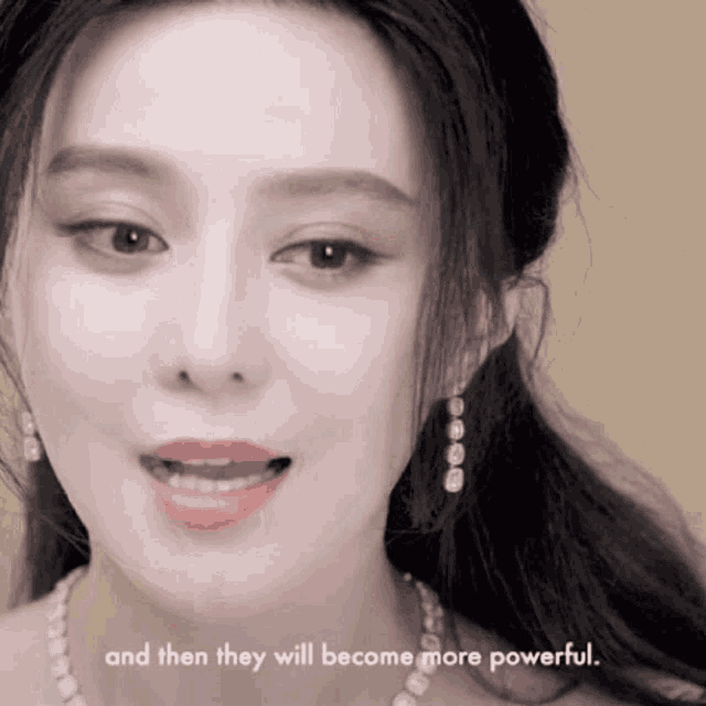 a close up of a woman 's face with the words and then they will become more powerful below her