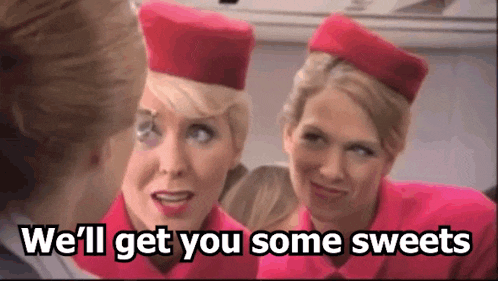 two stewardess are talking to each other and the words we 'll get you some sweets are on the bottom