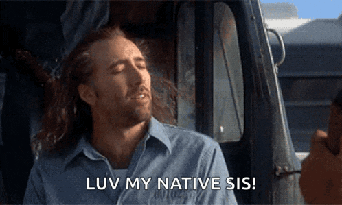 a man in a blue shirt says " luv my native sis " while sitting in a car
