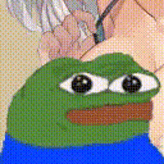 a close up of a person holding a green frog with big eyes .