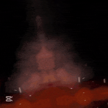 a blurry image of a person 's face with a x on the bottom