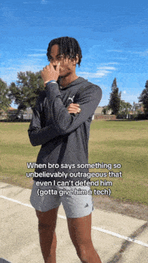 a man is standing in a field with his arms crossed and a caption that says when bro says something