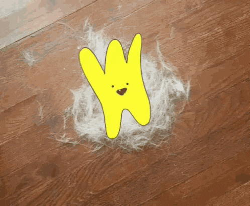 a cartoon drawing of a yellow bunny with a brown face