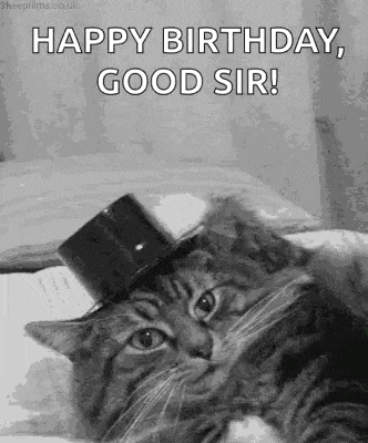 a black and white photo of a cat wearing a top hat and saying happy birthday , good sir .