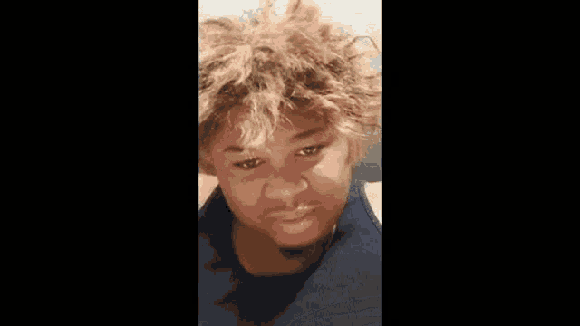 a close up of a man making a funny face