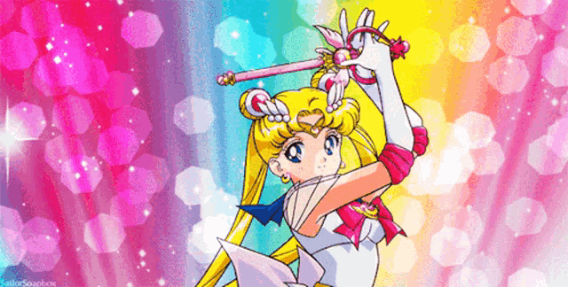 a picture of a sailor moon holding a wand