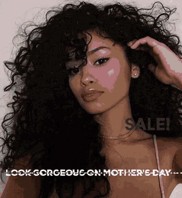 a picture of a woman with curly hair and the words sale