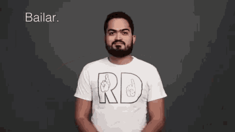 a man with a beard is wearing a white t-shirt that says rd on it .