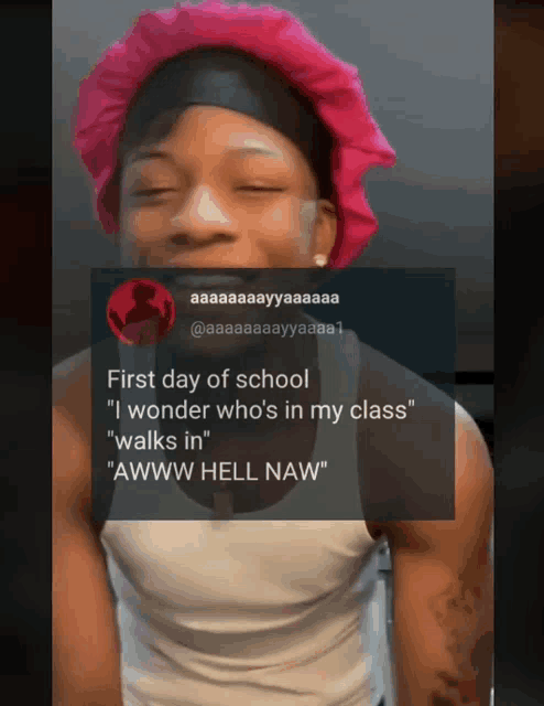 a man wearing a pink beanie says first day of school
