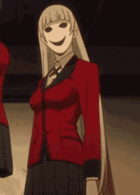a woman wearing a red jacket and a white mask is standing in front of a wall .