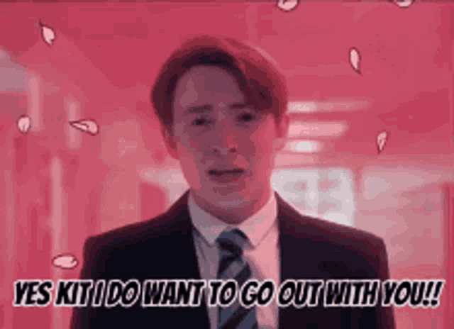 a man in a suit and tie says yes kit i do want to go out with you !