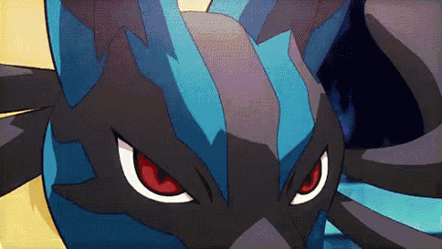 a close up of a cartoon character 's face with red eyes .
