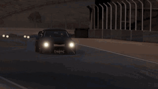 a black race car with the number 50 on it