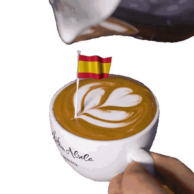 a cup of coffee with a flag on top that says aitan aliola