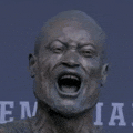 a statue of a man with his mouth open and the word enia behind him