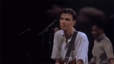 David Byrne Guitar Playing GIF - David Byrne Guitar Playing Singing GIFs