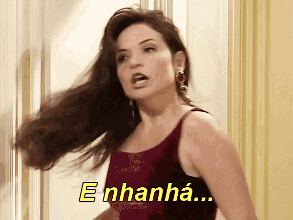 a woman in a purple top says " enhanha "