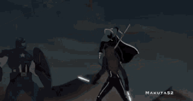 a man in a superhero costume is holding a stick and fighting a woman .