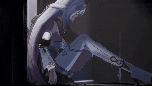 a woman with long white hair is sitting down with her legs crossed
