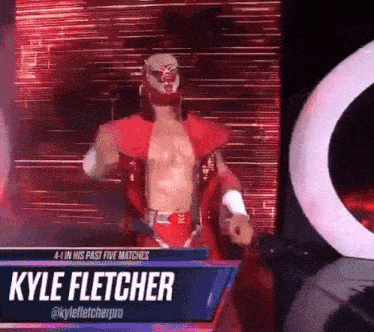 a wrestler named kyle fletcher is walking on stage