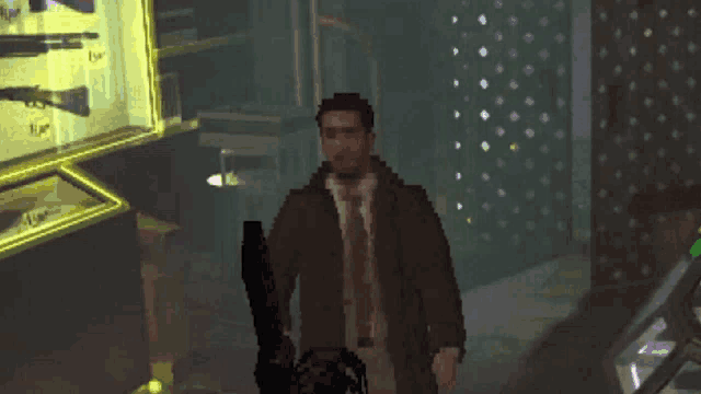 a pixelated image of a man holding a gun with the words jesus written below him