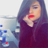 a woman with long hair and red lips is standing in front of a bottle of water .