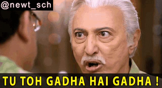 a man with gray hair and a mustache says tu toh gadha hai gadha !