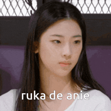 a close up of a woman 's face with the words ruka de anie on the bottom