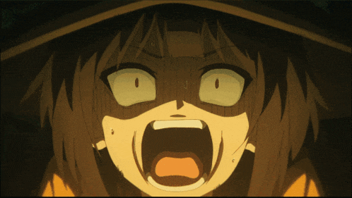 a close up of a girl with her mouth open