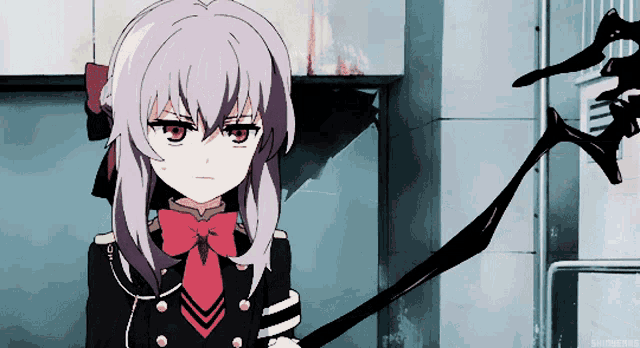 a girl with purple hair and a red bow tie is holding a black object