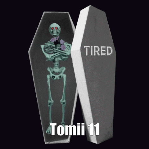 a skeleton in a coffin with the word tired written on it