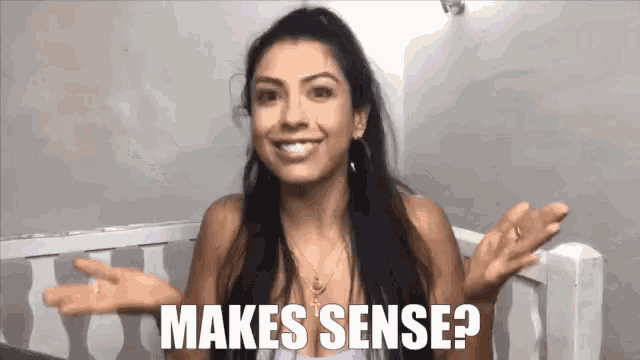 a woman sitting in a crib with the words makes sense