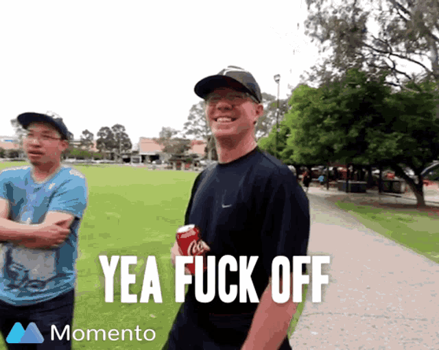 a man holding a can of coca cola says yea fuck off in a momento video