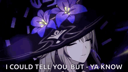 a girl wearing a witch hat with purple flowers on it is talking to someone .