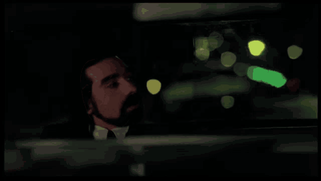 a man in a suit and tie says i 'm gonna kill her with a.44 magnum pistol