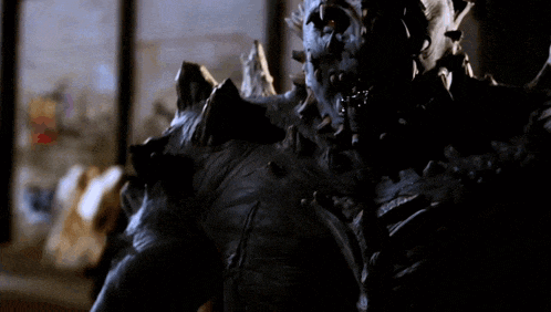 a close up of a monster with spikes on it