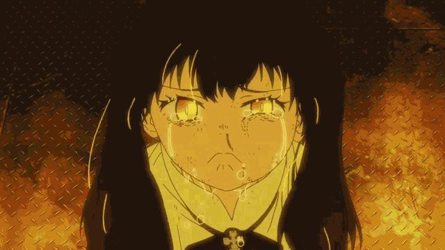 a girl with tears running down her face has a cross on her neck