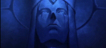 a close up of a person 's face in a dark room with glowing eyes .