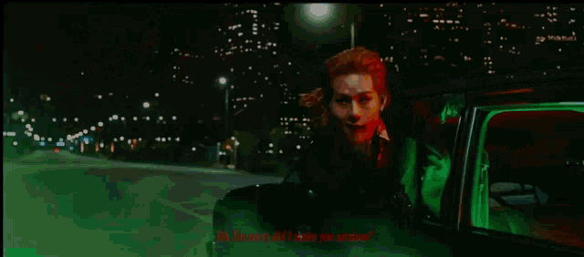 a man is sitting in a green car with the words oh i 'm sorry did i make you smile ..