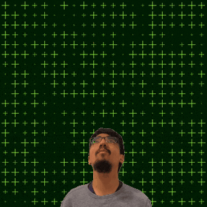 a man stands in front of a green background with the number 19 in yellow