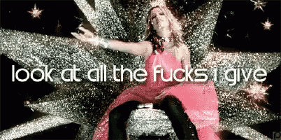 a woman in a pink dress is dancing with the words look at all the fucks i give below her