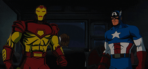iron man and captain america are standing in a room