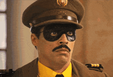 a man in a military uniform has a mustache and a mask on