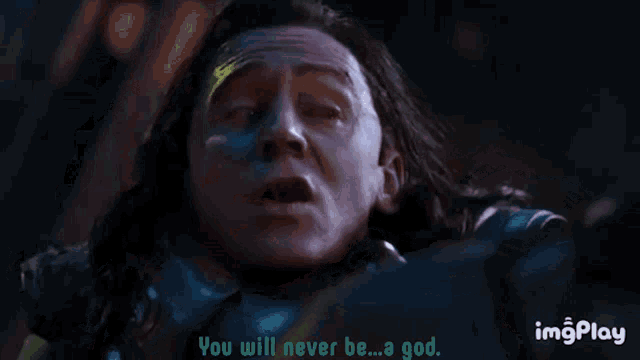 a close up of a person with the words " you will never be a god "