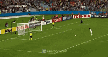 a soccer game is being played on a field sponsored by toyota and samsung