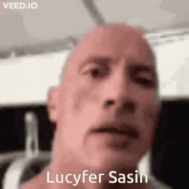 a close up of a man 's face with the name lucyfer sasin written on the bottom